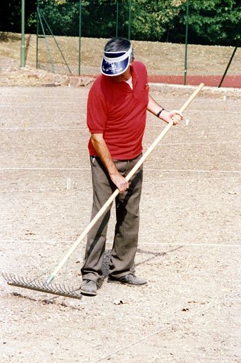 10 Untitled-Scanned-14 (2)_edited-1.jpg - James Ward using the back of the rake to "fine tune" the levelling.